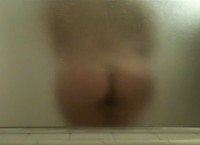 Amateur girl in the shower shows her nice ass