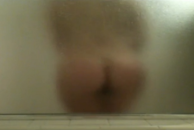 Amateur girl in the shower shows her nice ass